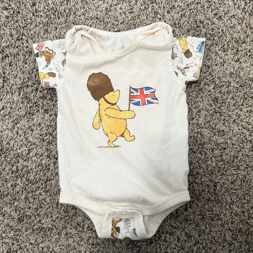 Winnie The Pooh in England onesie